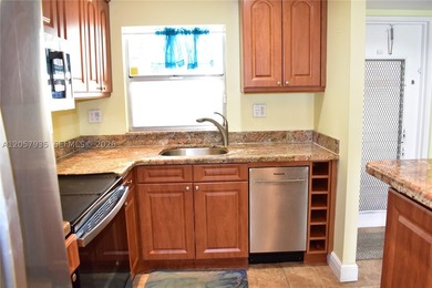 This is a bright, nicely updated condo with a happy vibe. It is - photo 3