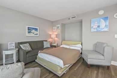 Welcome to this beautifully updated, fully furnished top-floor - photo 11