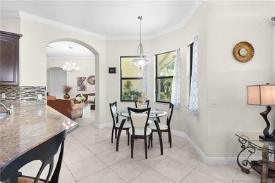 Nestled in The Falls of Jensen Beach, this spacious Kolter-built - photo 13