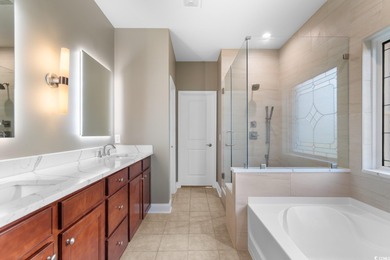 Experience the pinnacle of coastal luxury in this elegantly