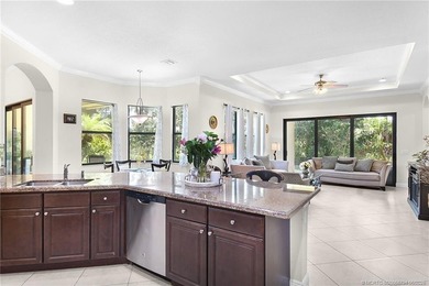 Nestled in The Falls of Jensen Beach, this spacious Kolter-built - photo 17