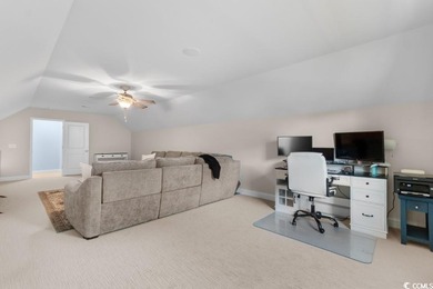 Experience the pinnacle of coastal luxury in this elegantly