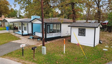 This stunning water-view home is a masterclass in modern - photo 2