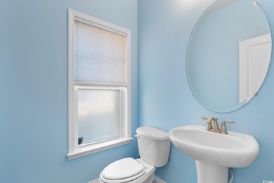 Experience the pinnacle of coastal luxury in this elegantly