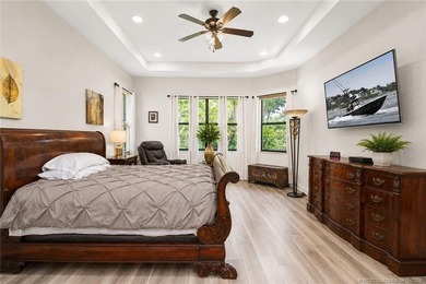 Nestled in The Falls of Jensen Beach, this spacious Kolter-built - photo 26