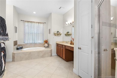 Nestled in The Falls of Jensen Beach, this spacious Kolter-built - photo 31