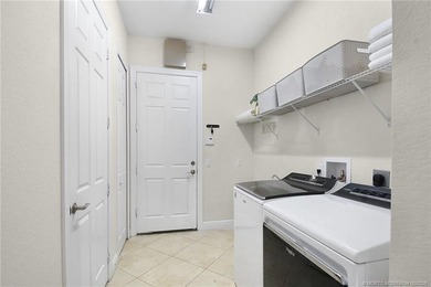 Nestled in The Falls of Jensen Beach, this spacious Kolter-built - photo 35