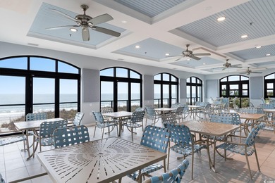 Experience the pinnacle of coastal luxury in this elegantly