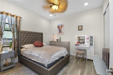 Nestled in The Falls of Jensen Beach, this spacious Kolter-built - photo 37