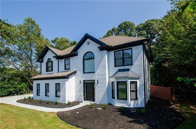 Beautifully Renovated 5 Bedroom 3.5 Bath Brick Front Home In The - photo 4