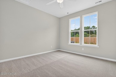 This spacious end unit townhome boasts a two-car garage - photo 12