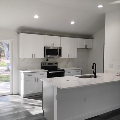 BRAND NEW 3 BEDROOM 2 BATH HOME WITH AN ATTACHED 1 CAR CARPORT - photo 13