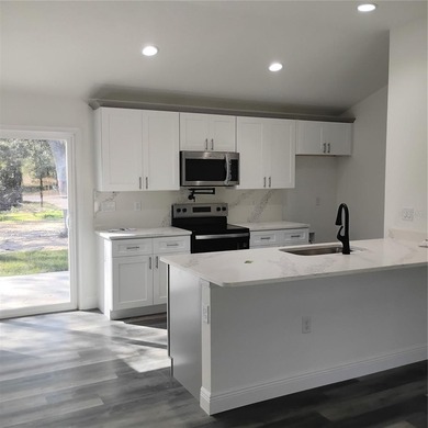 BRAND NEW 3 BEDROOM 2 BATH HOME WITH AN ATTACHED 1 CAR CARPORT - photo 14