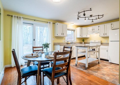This well-maintained 2-bedroom, 1.5-bath condo with a garage - photo 4
