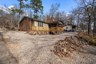 Discover your dream waterfront retreat on Lake Hamilton! This - photo 39