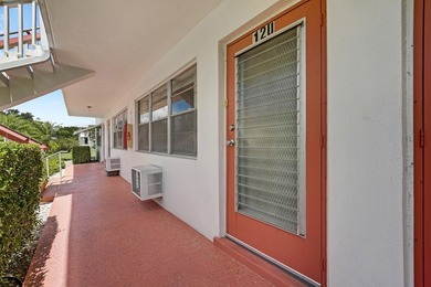 This 1st floor unit has a freshly painted interior and is a safe - photo 4