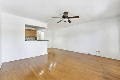 This 1st floor unit has a freshly painted interior and is a safe - photo 7