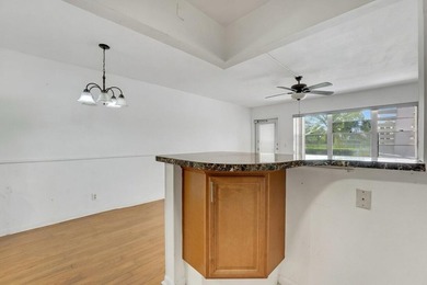 This 1st floor unit has a freshly painted interior and is a safe - photo 9