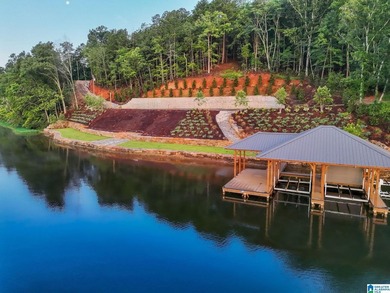 One of the largest waterfront lots on Lake Mitchell has - photo 1