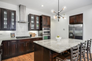 Located within an intimate seven-residence elevator building on