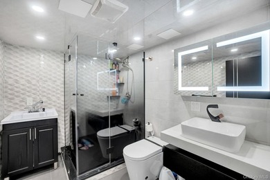 Rare Bayside Offering with Private Basement & Separate Entrance - photo 19