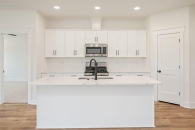 New construction 3BR/2BA home in Game Farm subdivision featuring - photo 11