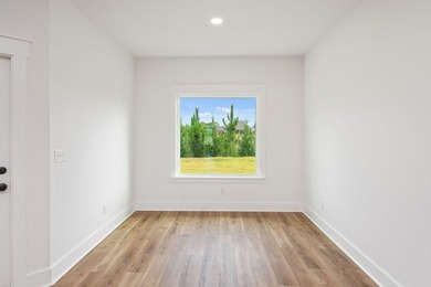 New construction 3BR/2BA home in Game Farm subdivision featuring - photo 18