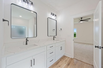 New construction 3BR/2BA home in Game Farm subdivision featuring - photo 23
