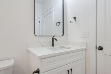New construction 3BR/2BA home in Game Farm subdivision featuring - photo 34