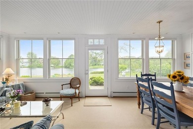 Perched at the water's edge, 19 Teal Drive is a custom-built - photo 18