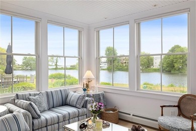 Perched at the water's edge, 19 Teal Drive is a custom-built - photo 19