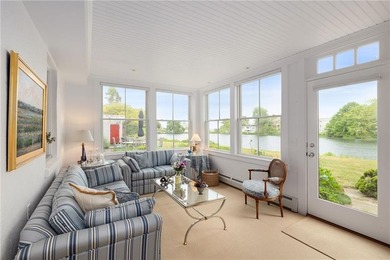 Perched at the water's edge, 19 Teal Drive is a custom-built - photo 21