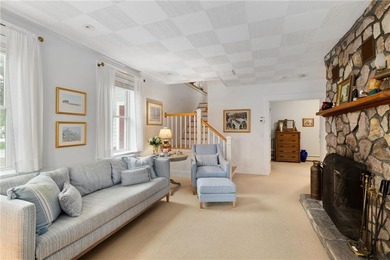 Perched at the water's edge, 19 Teal Drive is a custom-built - photo 26