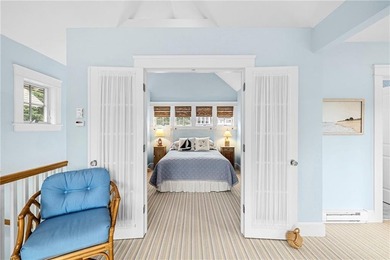 Perched at the water's edge, 19 Teal Drive is a custom-built - photo 41