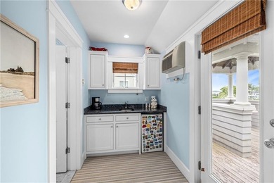 Perched at the water's edge, 19 Teal Drive is a custom-built - photo 43