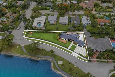 Nestled on an impressive 25,000-square-foot lot, this - photo 1