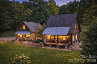 Welcome to this highly acclaimed, custom log home nestled on 13 - photo 1