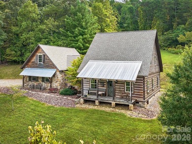 Welcome to this highly acclaimed, custom log home nestled on 13 - photo 2