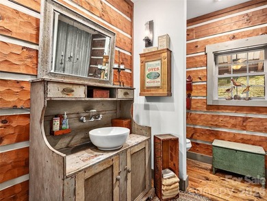 Welcome to this highly acclaimed, custom log home nestled on 13 - photo 10
