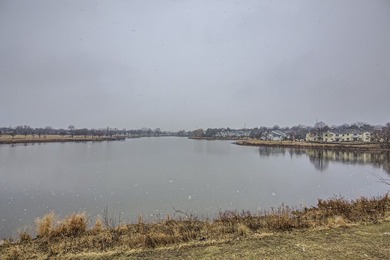 Enjoy serene water views from your private balcony in this 2-bed - photo 10