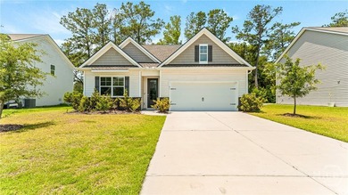 Welcome to this beautiful 4-bedroom, 2-bath home featuring an - photo 4