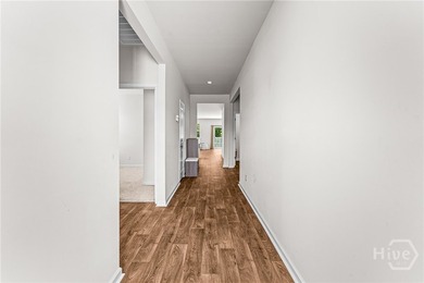 Welcome to this beautiful 4-bedroom, 2-bath home featuring an - photo 8