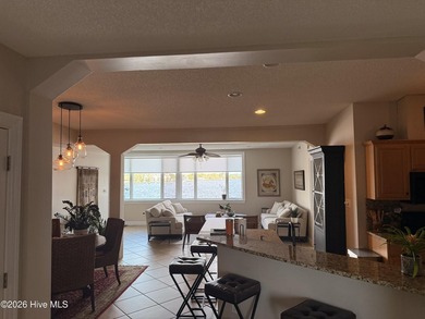 Impeccably maintained 3BR/2BA third-floor waterfront condo in