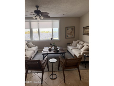 Impeccably maintained 3BR/2BA third-floor waterfront condo in