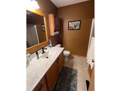 Beautifully updated home in Izatys Resort, perfectly situated on - photo 13