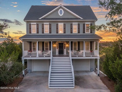 Nestled on approximately 1.4 acres at the end of a quiet