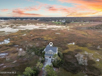 Nestled on approximately 1.4 acres at the end of a quiet