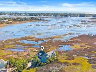 Nestled on approximately 1.4 acres at the end of a quiet