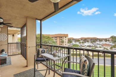 This two-bedroom, two-bath condominium offers a relaxed - photo 2