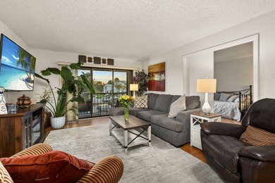 Move-in ready 3-bedroom, 2-bath second-floor condo in the gated - photo 3